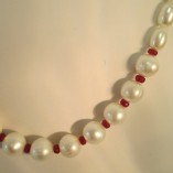 Pearls and ruby necklace detail